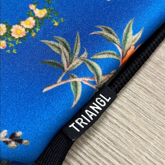Two triangl drawstring bags